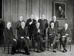 Joseph Chamberlian's war cabinet; Churchill is standing behind Chamberlain