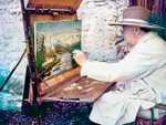 Winston Churchill painting at Chartwell, puffing away at a cigar